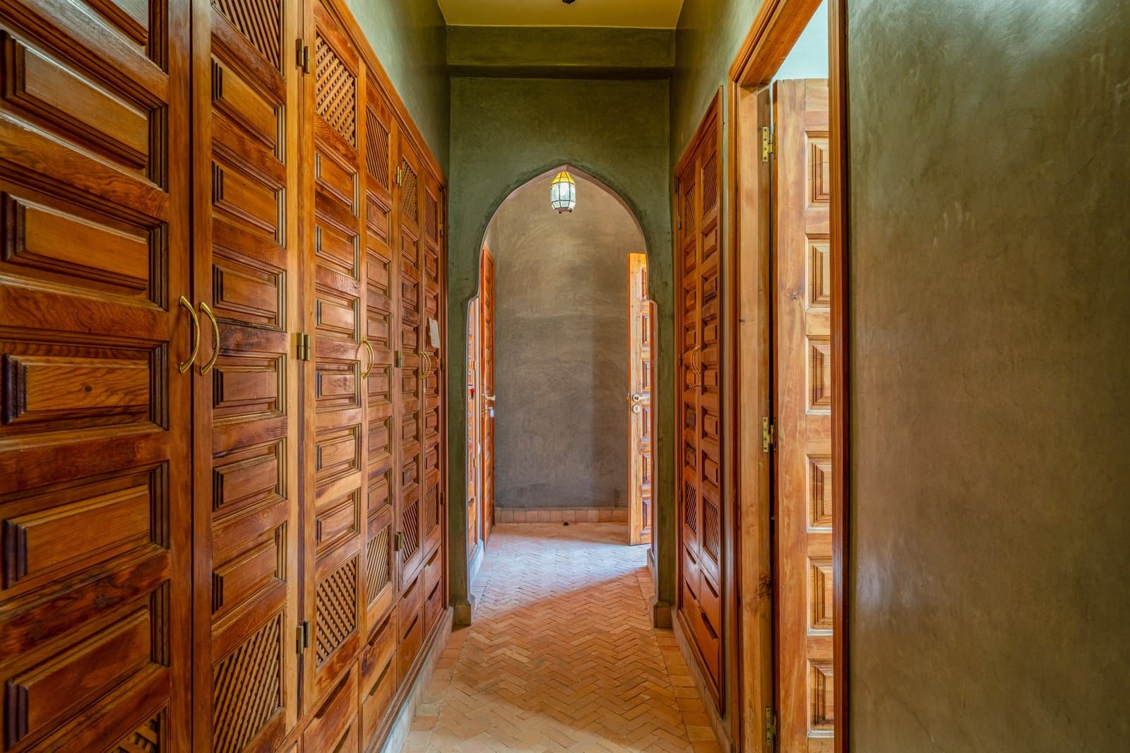 Hall: Interior hallway carved wardrobe Moorish arch